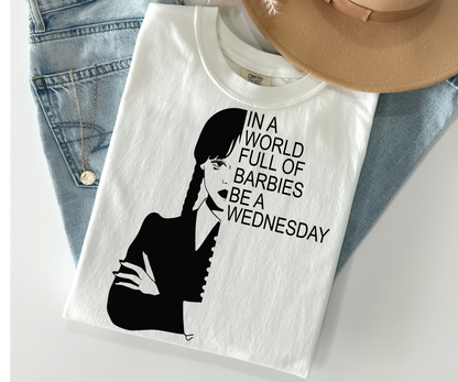 In a world full of Barbies, be a Wednesday shirt, Nevermore Academy comfort color, The Addams Family funny T-shirt, Wednesday and Mondays.